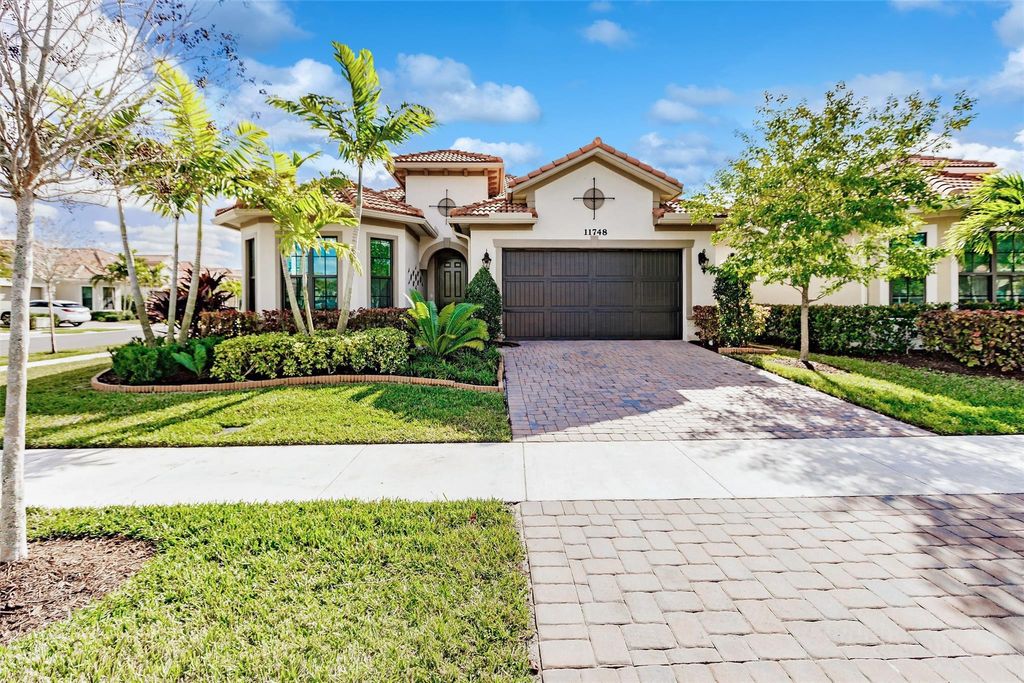 Photo of 11748 Fortress Run, Parkland, FL 33076 (MLS # F10528406)