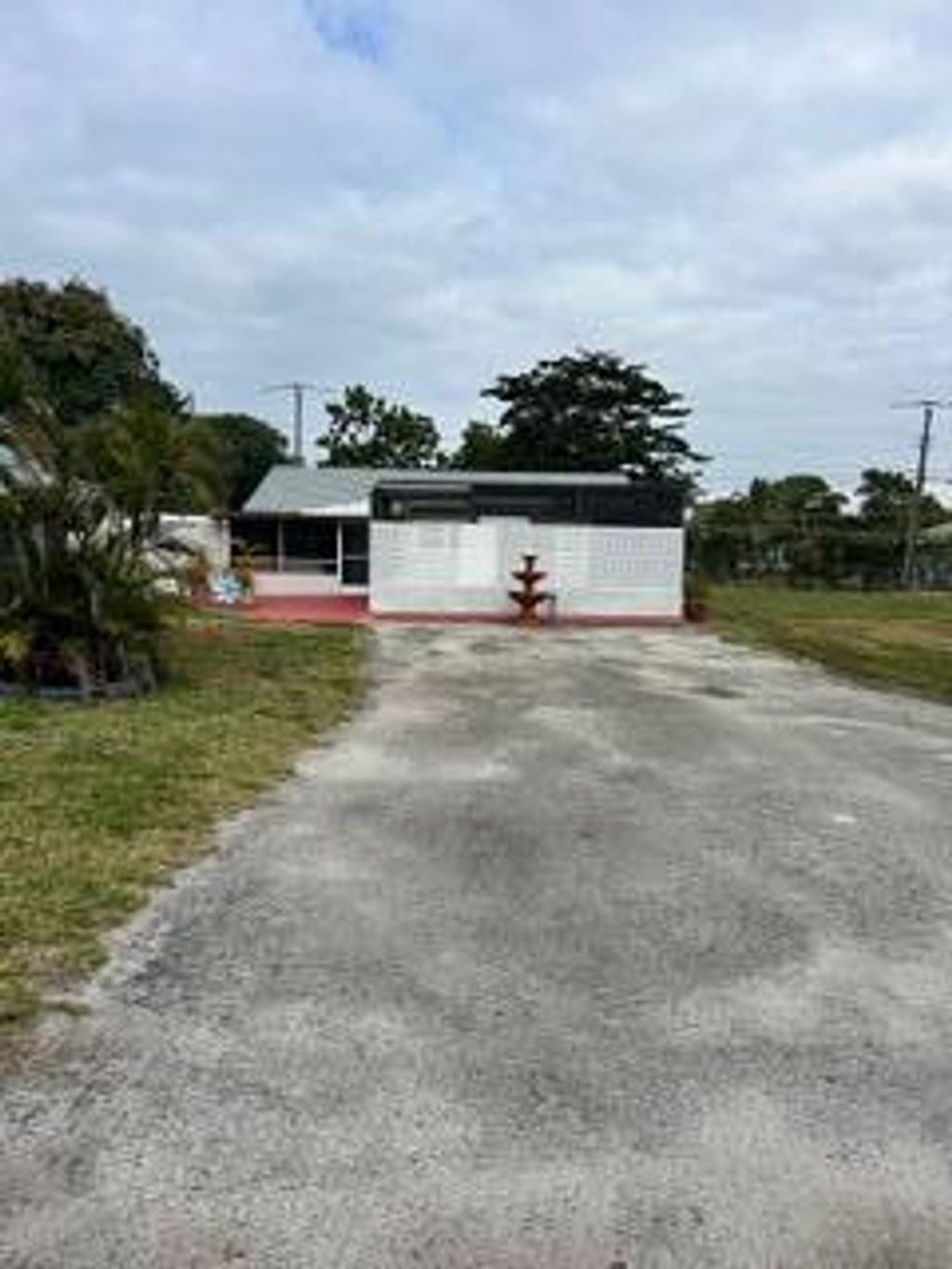 Photo of 4415 Tellin Avenue, West Palm Beach, FL 33406 (MLS # R11160987)