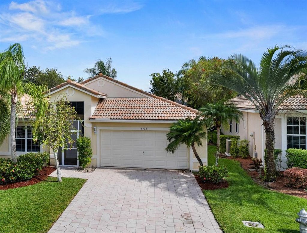 Photo of 8708 San Andros, West Palm Beach, FL 33411 (MLS # R10807284)