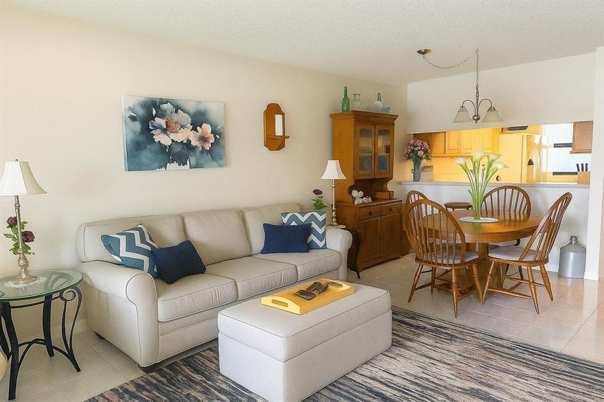 Beautifully maintained 2-bedroom, 2-bathroom waterfront condo located in an all-ages community. This unit features impact windows and a bright, comfortable living space, along with extended kitchen cabinetry providing extra storage. Enjoy the convenience of a full-size washer and dryer in-unit and a desirable split floor plan. Relax with peaceful water views in this quiet, well-kept community. The association fee includes water, basic cable, building insurance, and access to amenities such as a community pool, tennis courts, and clubhouse. No pets (unless ESA approved) and no rentals allowed. Minimum credit score of 700 required per association.