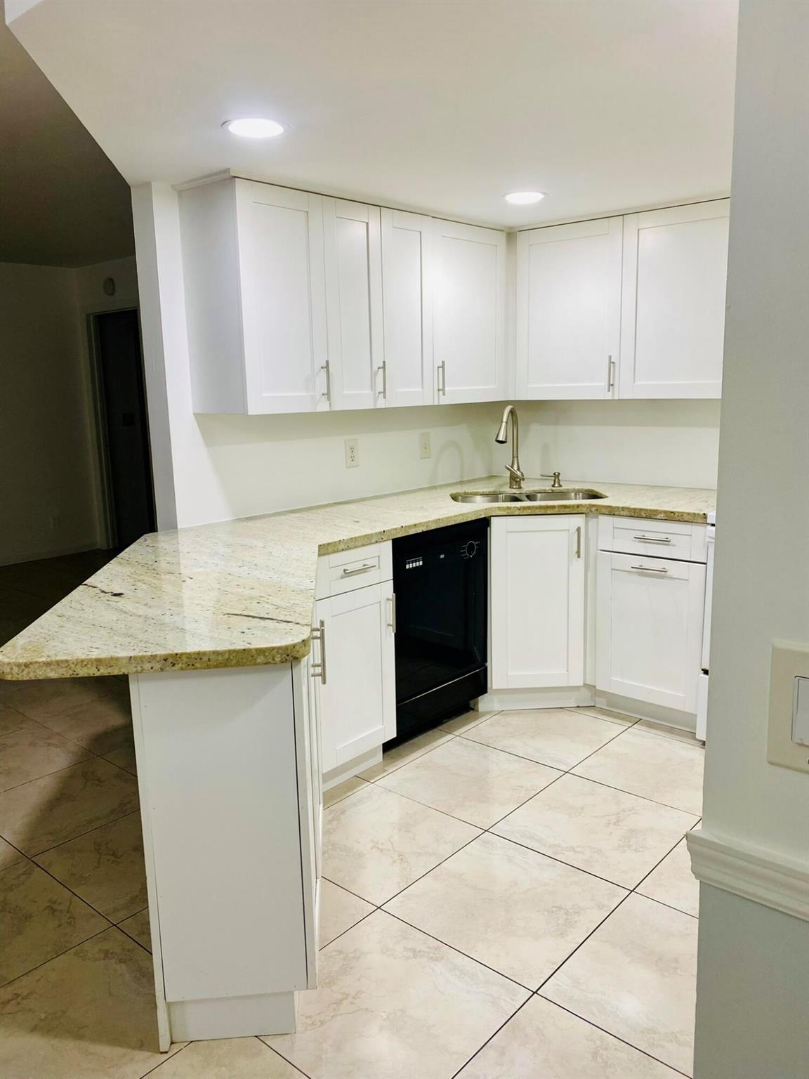 Best location in Jupiter! Nice Updated 2/2 GROUND level Condo with water included. This is a peaceful location facing a beautiful garden and green areas, the unit has New Modern Kitchen with GRANITE countertops and ceramic tile. New vanities in bathroom, Walking closet. Freshly painted. Two assigned parking spots. Close to the pool, tennis courts and community clubhouse. Located in the best of Jupiter with easy access to I-95 and Turnpike. Information is deemed to be reliable, but is not guaranteed.