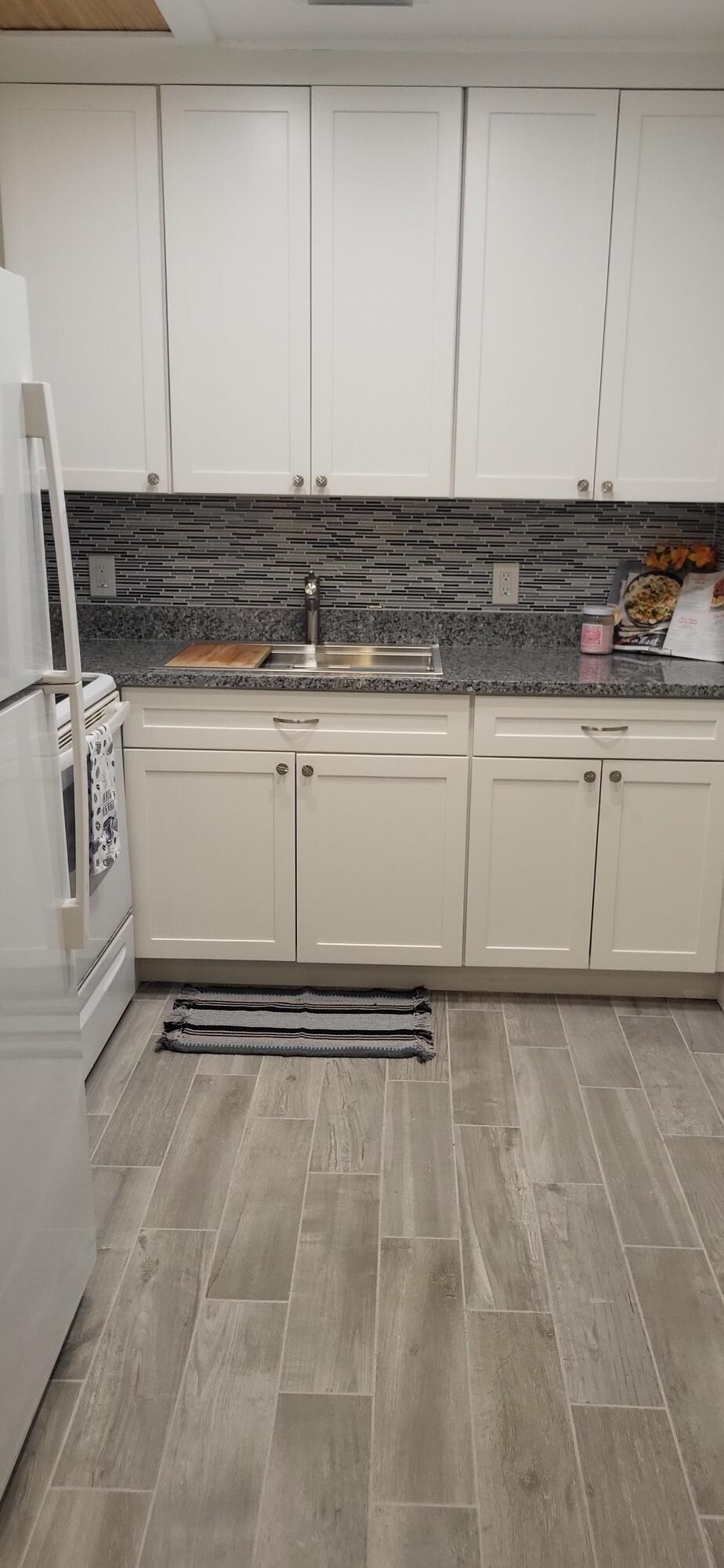 TILFORD M CONDO - Residential Lease