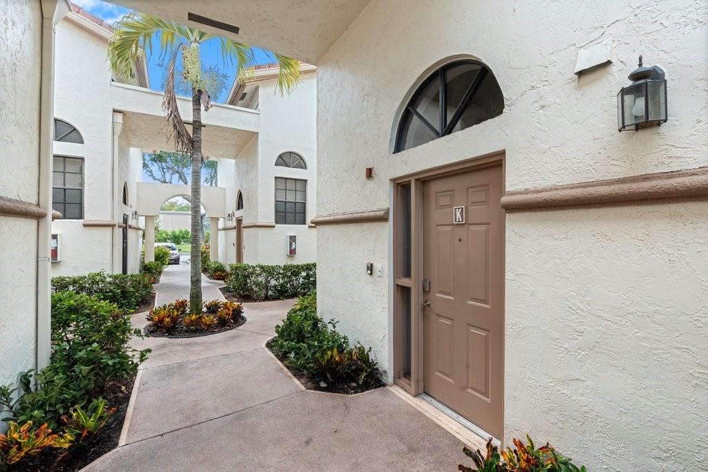 Stunning 3-bedroom, 2-bath condo with private elevator and peaceful lake views! This fully furnished home is located in an all-ages, gated community with resort-style amenities. Featuring vaulted ceilings, a spacious split-bedroom floor plan, and a screened-in patio overlooking the water, this unit offers both comfort and style. The private elevator brings you directly to the main living area. The primary suite includes a custom walk-in closet and a luxurious bathroom with a custom walk-in jacuzzi tub—perfect for relaxing after a long day. Enjoy access to a clubhouse, pool, fitness center, tennis courts, and more. Ideally located near shopping, dining, beaches, and major highways. A must-see!