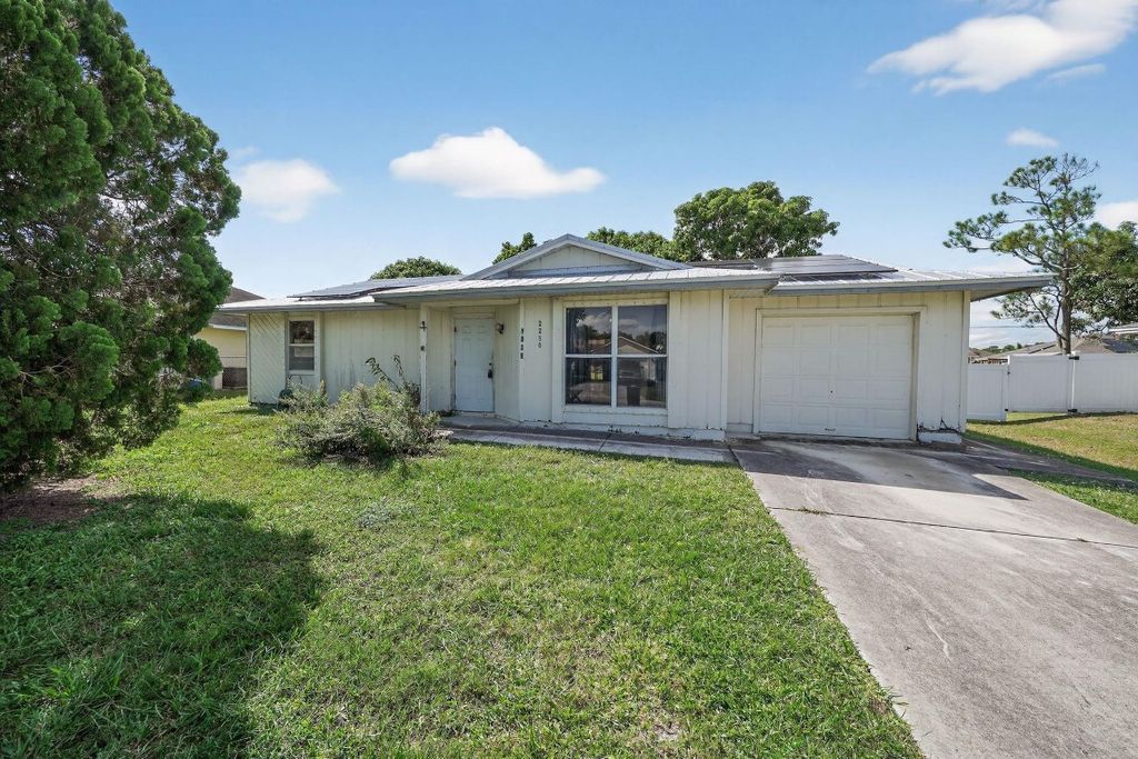 Photo of 2250 SE Glover Street, Port Saint Lucie, FL 34984 (MLS # F10533260)