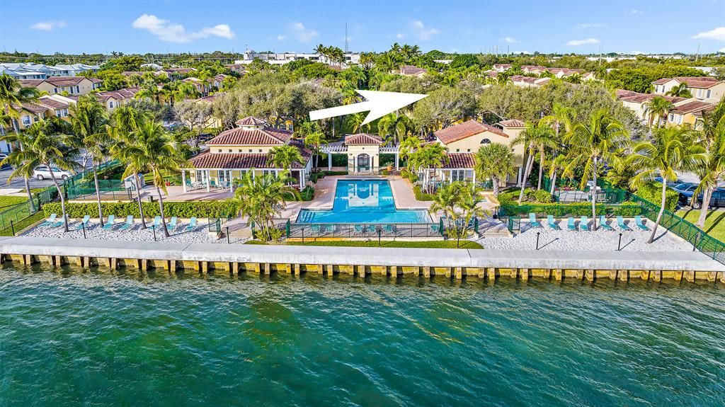 Photo of 1140 Lake Shore Drive #202, Lake Park, FL 33403 (MLS # R10858561)