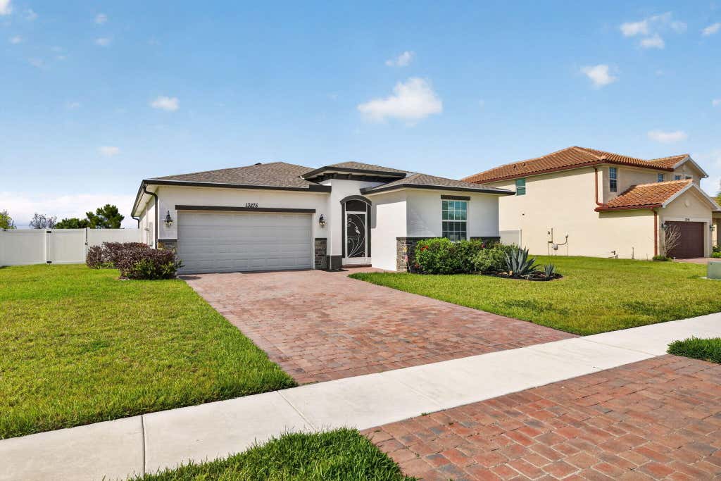 Photo of 13275 NW Copper Creek Drive, Port Saint Lucie, FL 34987 (MLS # B26049164)
