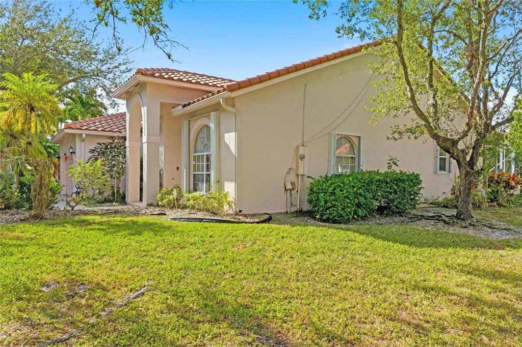 Photo of 5374 NW 57th Avenue, Coral Springs, FL 33067 (MLS # B26047309)