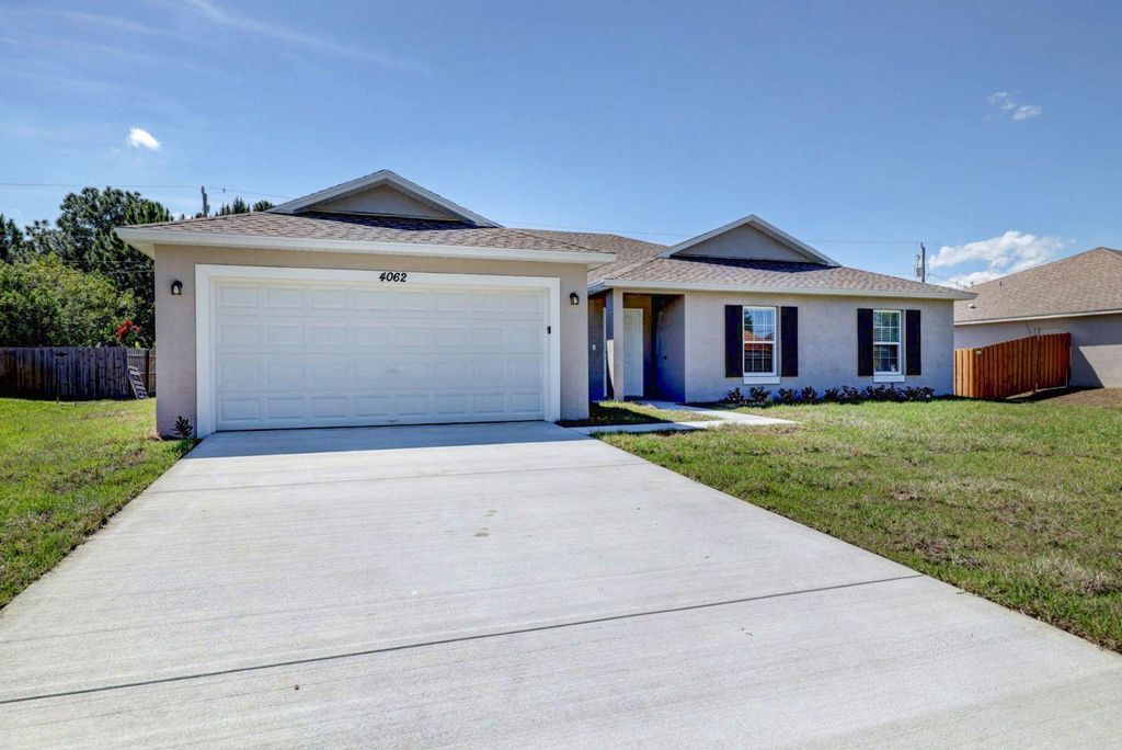 Photo of 4133 SW Bamberg Street, Port Saint Lucie, FL 34953 (MLS # B26016803)