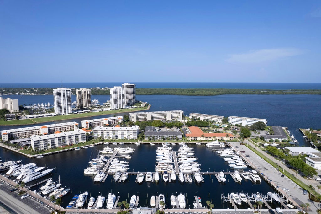 Photo of 21 Yacht Club Drive #103, North Palm Beach, FL 33408 (MLS # R11059694)