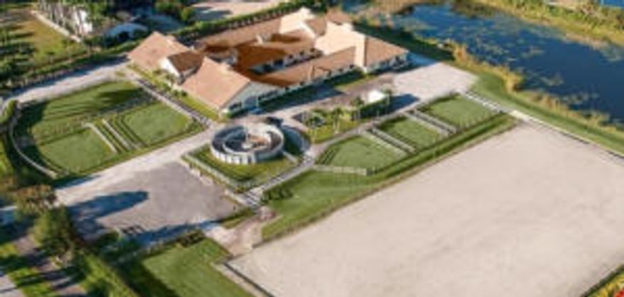 This listing is a 6.04 acre property with accommodation for 45 horses in the stable, three apartments, 9 paddocks, and a 140' x 250' sand ring installed.  Meticulously planned, it is one of the few barns that the division of space allows for several groupings of clientele. An income producing property in the mid-six figures, it comes with a seasonal lease through April 2016 that guarantees a profit with still space for 15 personal stalls that can be private, separate, and center stage at the front of the barn with its own office, tackroom, feed room, and bathroom