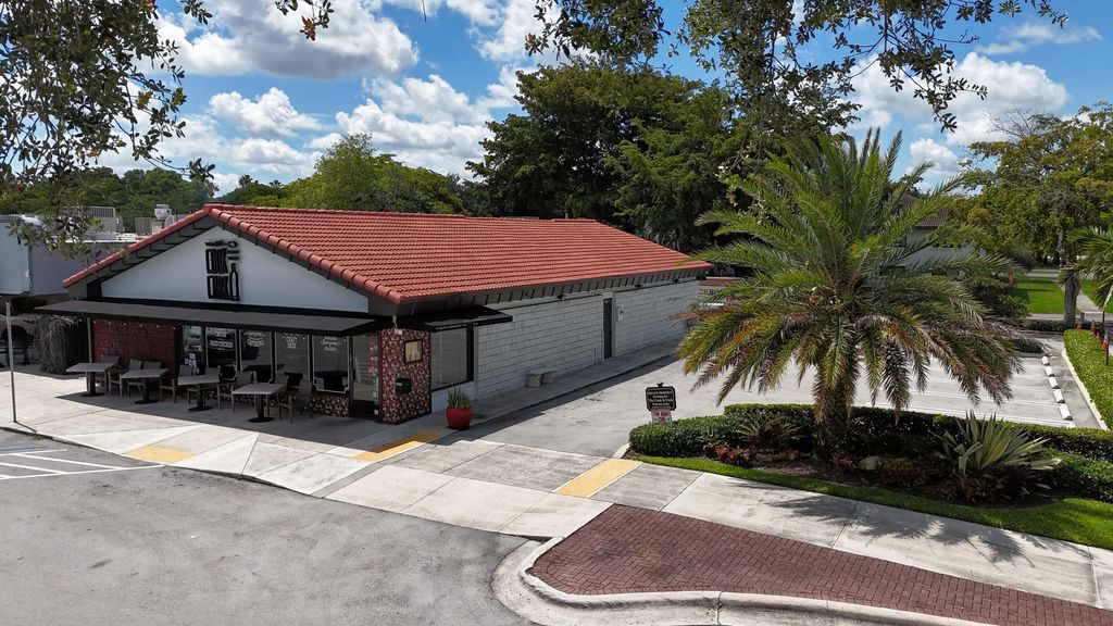 Photo of 9890 W Sample Road, Coral Springs, FL (MLS # B26031114)
