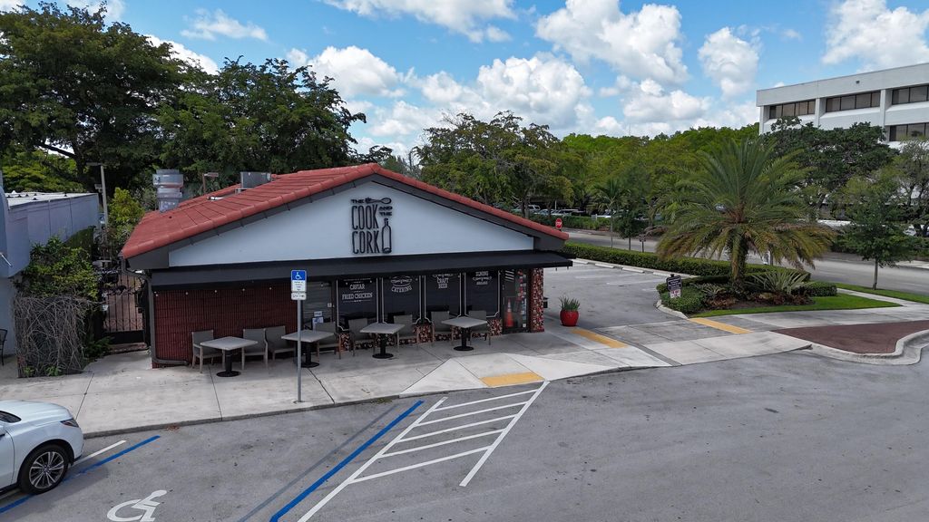 Photo of 9890 W Sample Road, Coral Springs, FL (MLS # B26031114)