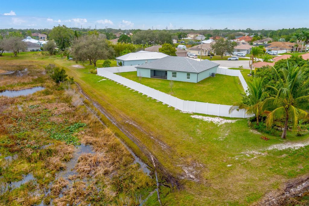 Photo of 5849 NW Alpha Court, Port Saint Lucie, FL 34986 (MLS # R10953700)