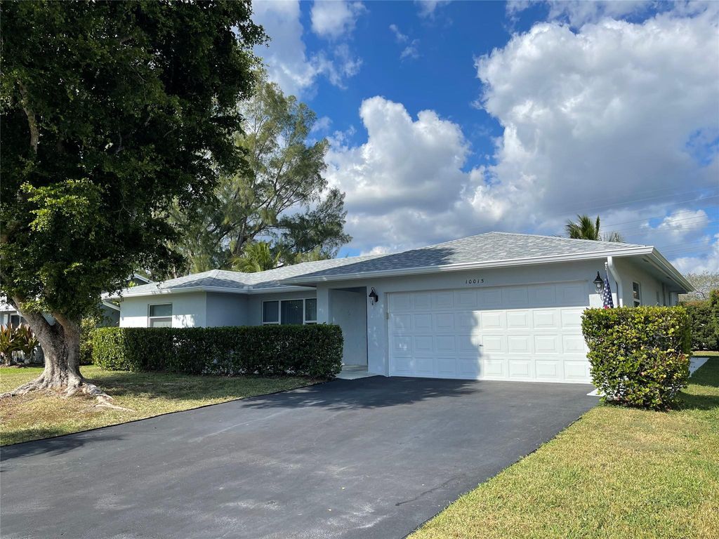 Photo of 10015 NW 83rd St, Tamarac, FL 33321 (MLS # F10537542)