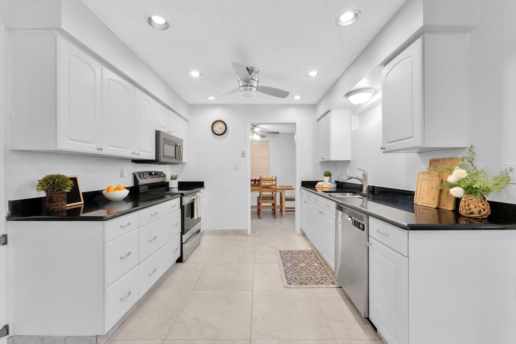 Photo of 10015 NW 83rd St, Tamarac, FL 33321 (MLS # F10537542)