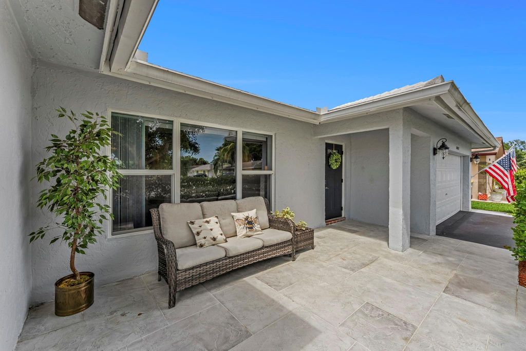 Photo of 10015 NW 83rd St, Tamarac, FL 33321 (MLS # F10537542)