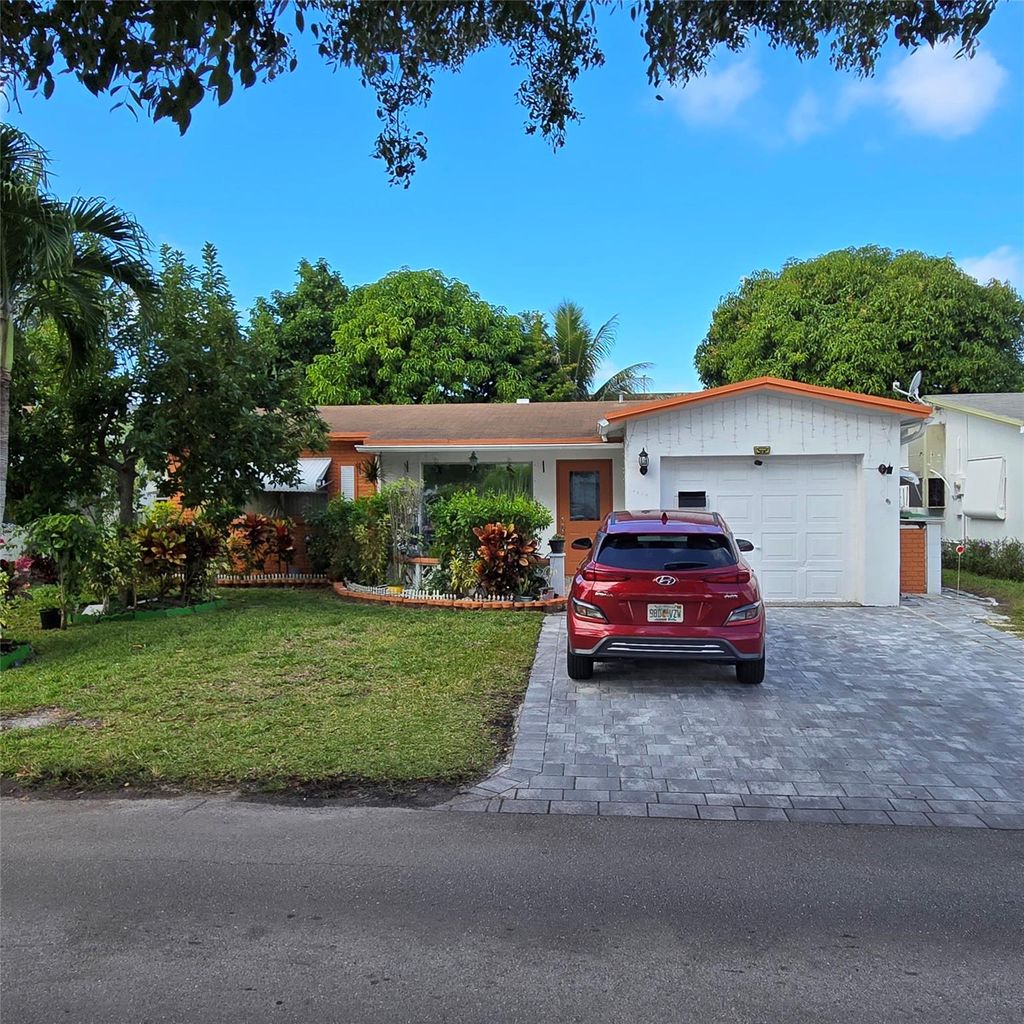 Photo of 4215 NW 52nd Ave, Lauderdale Lakes, FL 33319 (MLS # F10540953)