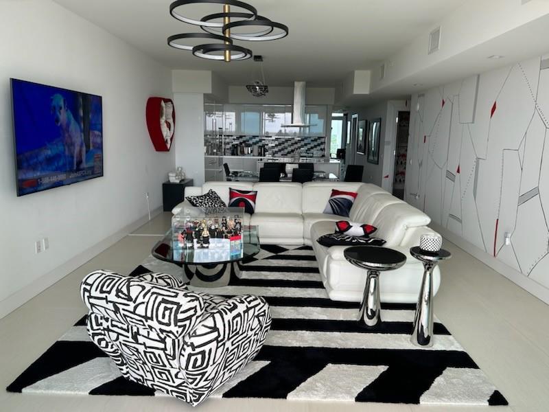 This is an absolutely flawless unit in every respect. Enter via your own private elevator access to the 7th floor gorgeous entryway. Two full bedrooms and a den/office area are appointed with designer touches on every square inch. 
Combined with a spectacular view of the golf course and community, this is a perfect home that will not require a single improvement or alteration. This is Akoya at its finest. 
No application fee for Akoya. $642 Membership application fee to the Country Club. Contracts submitted after September 30 will allow for the membership fee to be $115,000 plus the one time capital improvement of $10,000.
Does not include living room and primary bedroom fixture.