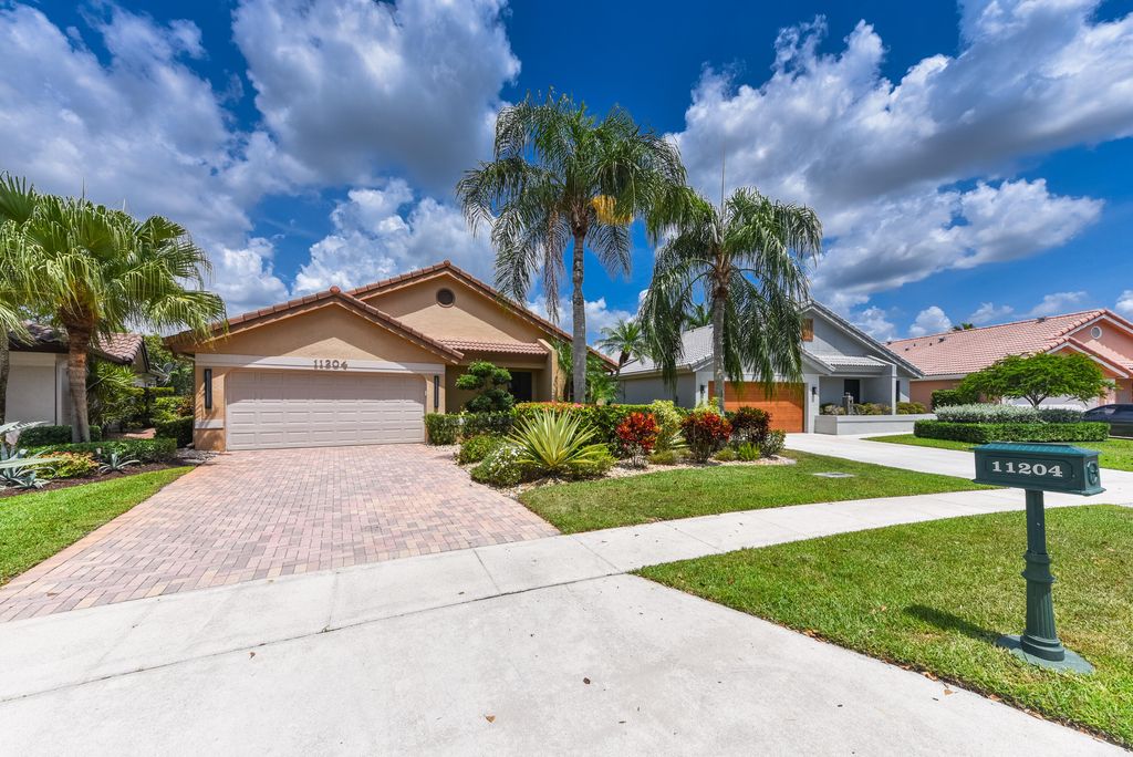 Photo of 11204 Cloverleaf Circle, Boca Raton, FL 33428 (MLS # B26029022)