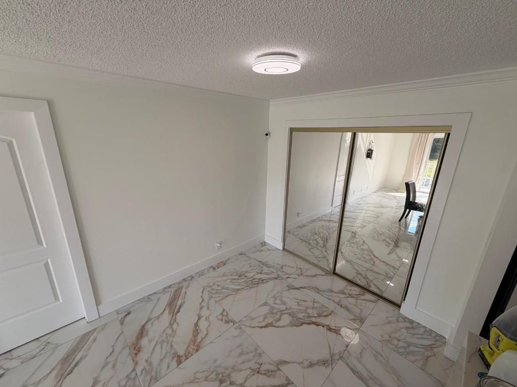 Photo of 1945 Abbey Road #201, West Palm Beach, FL 33415 (MLS # R11157893)