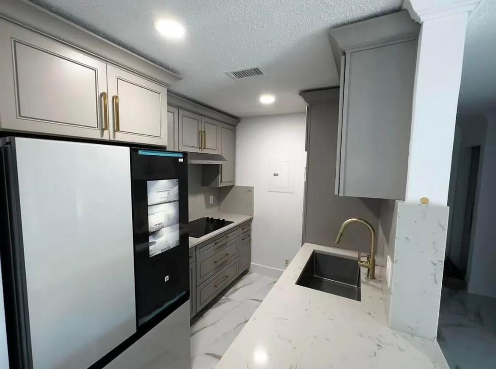 Photo of 1945 Abbey Road #201, West Palm Beach, FL 33415 (MLS # R11157893)