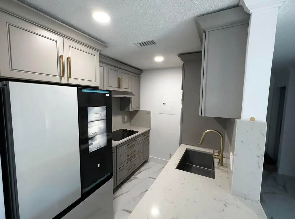 Photo of 1945 Abbey Road #201, West Palm Beach, FL 33415 (MLS # R11157893)