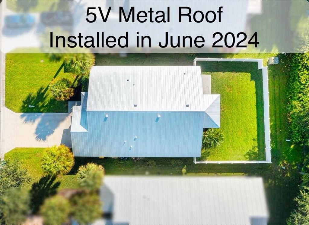 Photo of 8900 SW Bonneville Drive, Stuart, FL 34997 (MLS # R11025594)