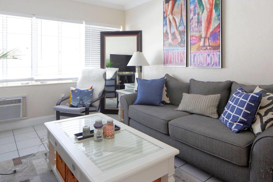 Spacious 1 bedroom and 1 bath apartment ready for someone to call it HOME. **** PROMOTION First month        FREE!!!, last month and a half-month security deposit only for qualified prospects (15-month lease). Unit has UPDATED KITCHEN with SS APPLIANCES. Unit also features lots of natural light, NEW Laminate floors throughout, plenty of closet space and large porch to enjoy Florida Weather.  Unit located in a gated, quiet and secure building.
 Laundry facility on site. Unit is walking distance to the beach and to Bal Harbour Mall & Restaurants, Haulover
 Beach, North Shore Beach & Oleta River State Park. Ample street parking. CATs OK, NO DOGS.