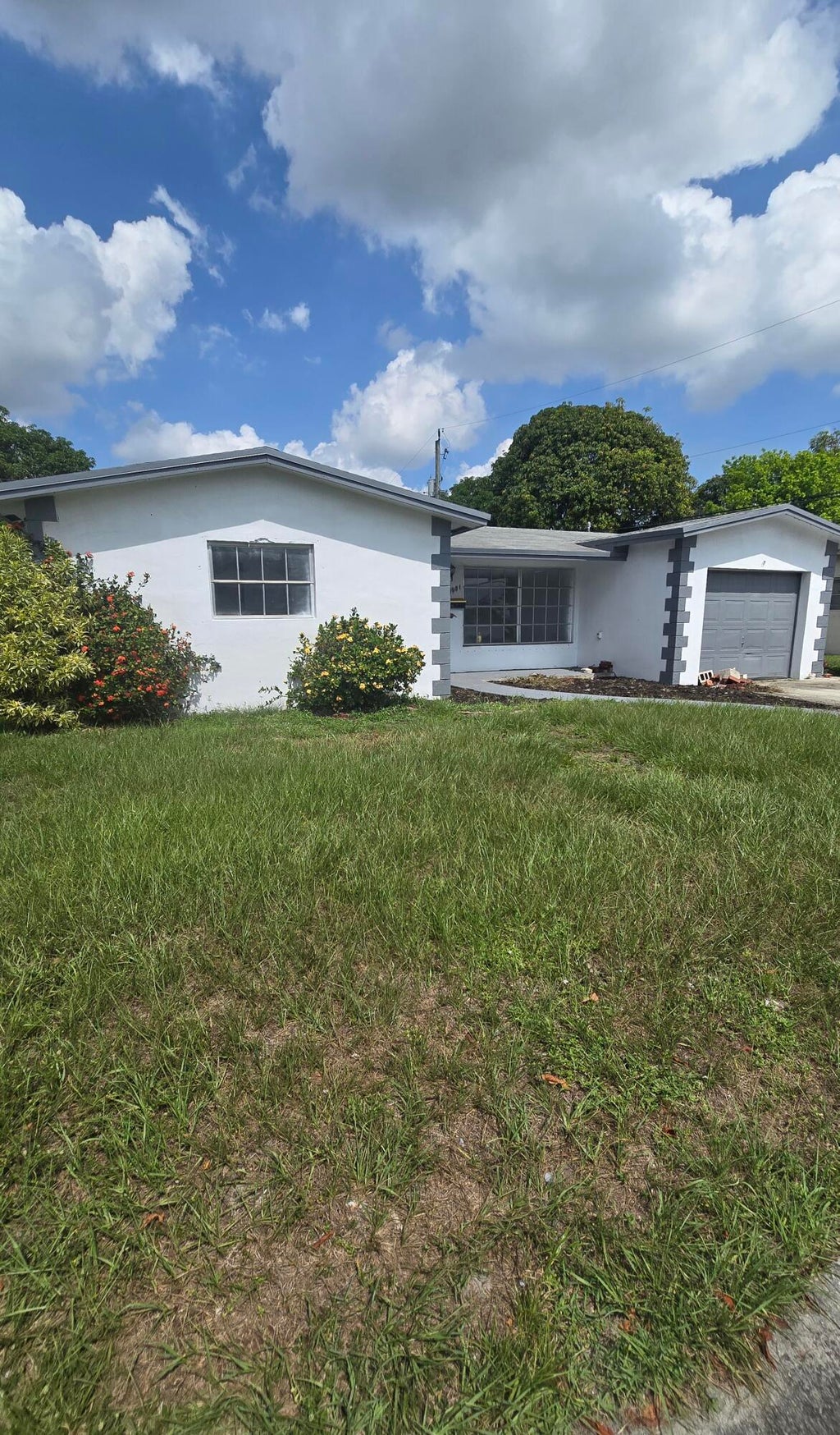 Photo of 2231 NW 49th Avenue, Lauderhill, FL 33313 (MLS # B26046496)