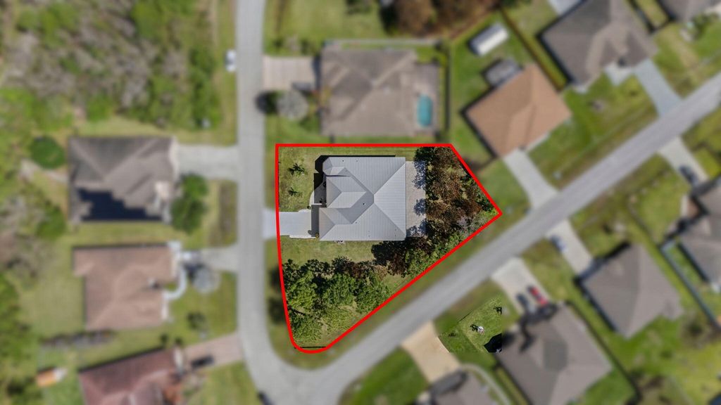 Photo of 5445 NW Briscoe Drive, Port Saint Lucie, FL 34986 (MLS # B26020114)