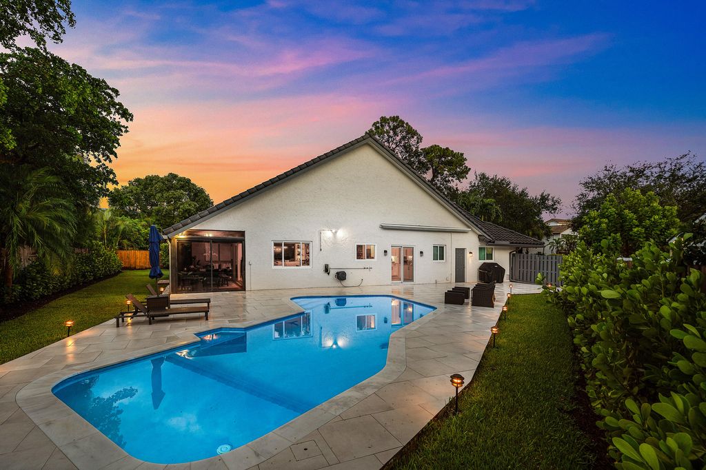 Photo of 2845 NW 42nd Street, Boca Raton, FL 33434 (MLS # B26018927)