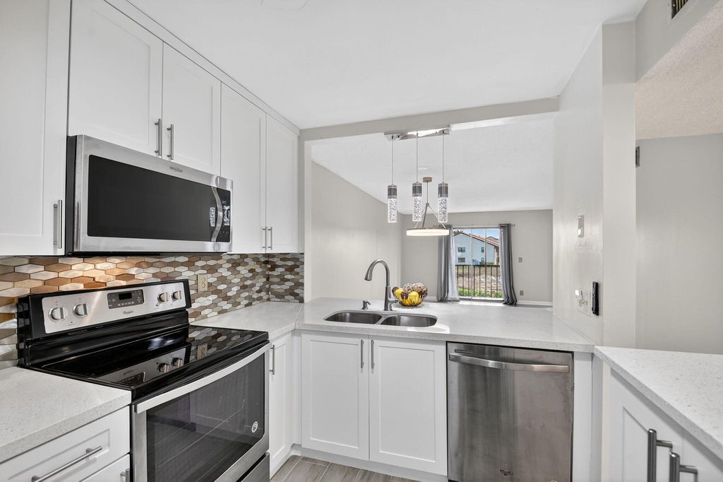 Photo of 7142 Golf Colony Court #206, Lake Worth, FL 33467 (MLS # R11167974)