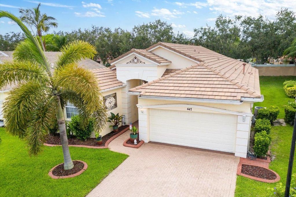 Photo of 447 SW Talquin Lane, Port Saint Lucie, FL 34986 (MLS # R11094987)