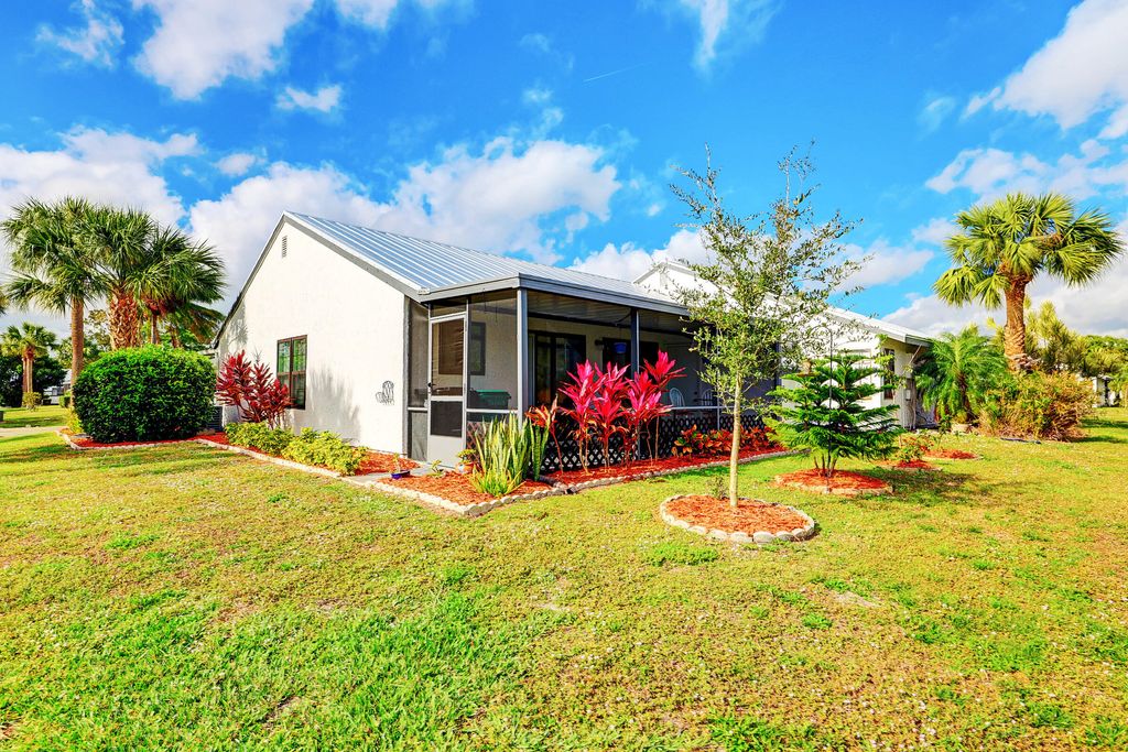 Photo of 421 SW Bill Traitel Avenue, Port St Lucie, FL 34953 (MLS # R10855900)