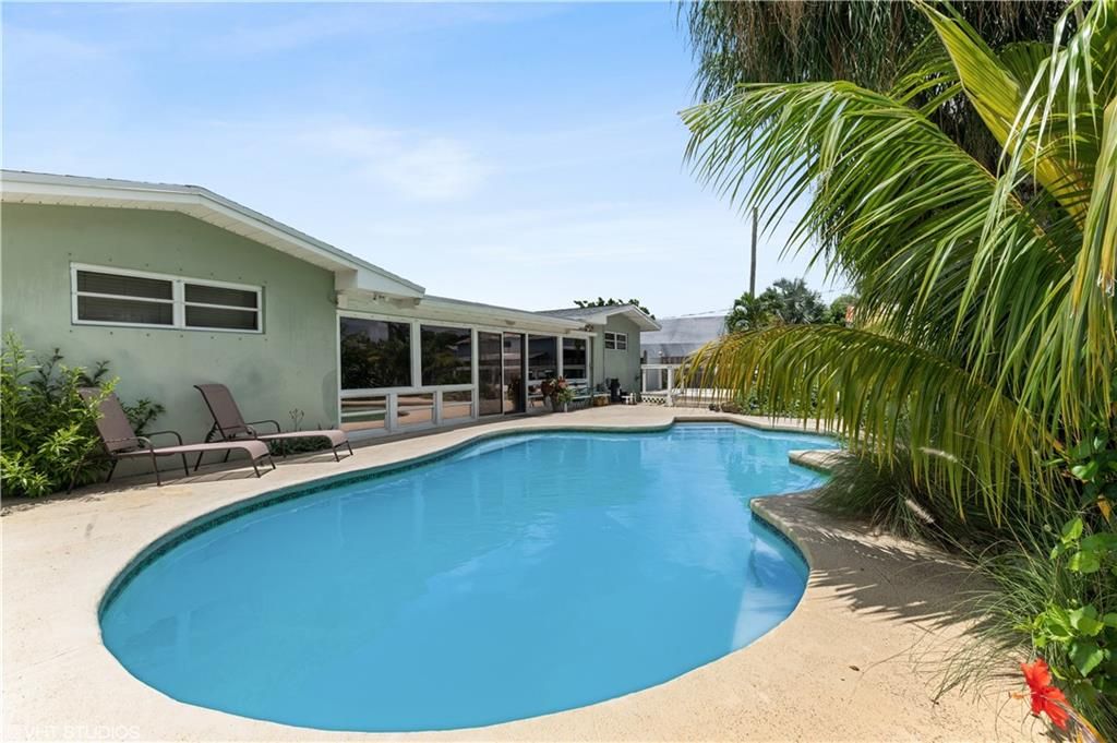 Photo of 4841 NW 76th Pl, Pompano Beach, FL 33073 (MLS # F10291262)