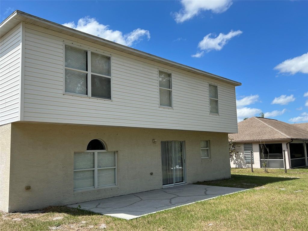 Photo of 3661 SW Europe Street, Port Saint Lucie, FL 34953 (MLS # F10420339)