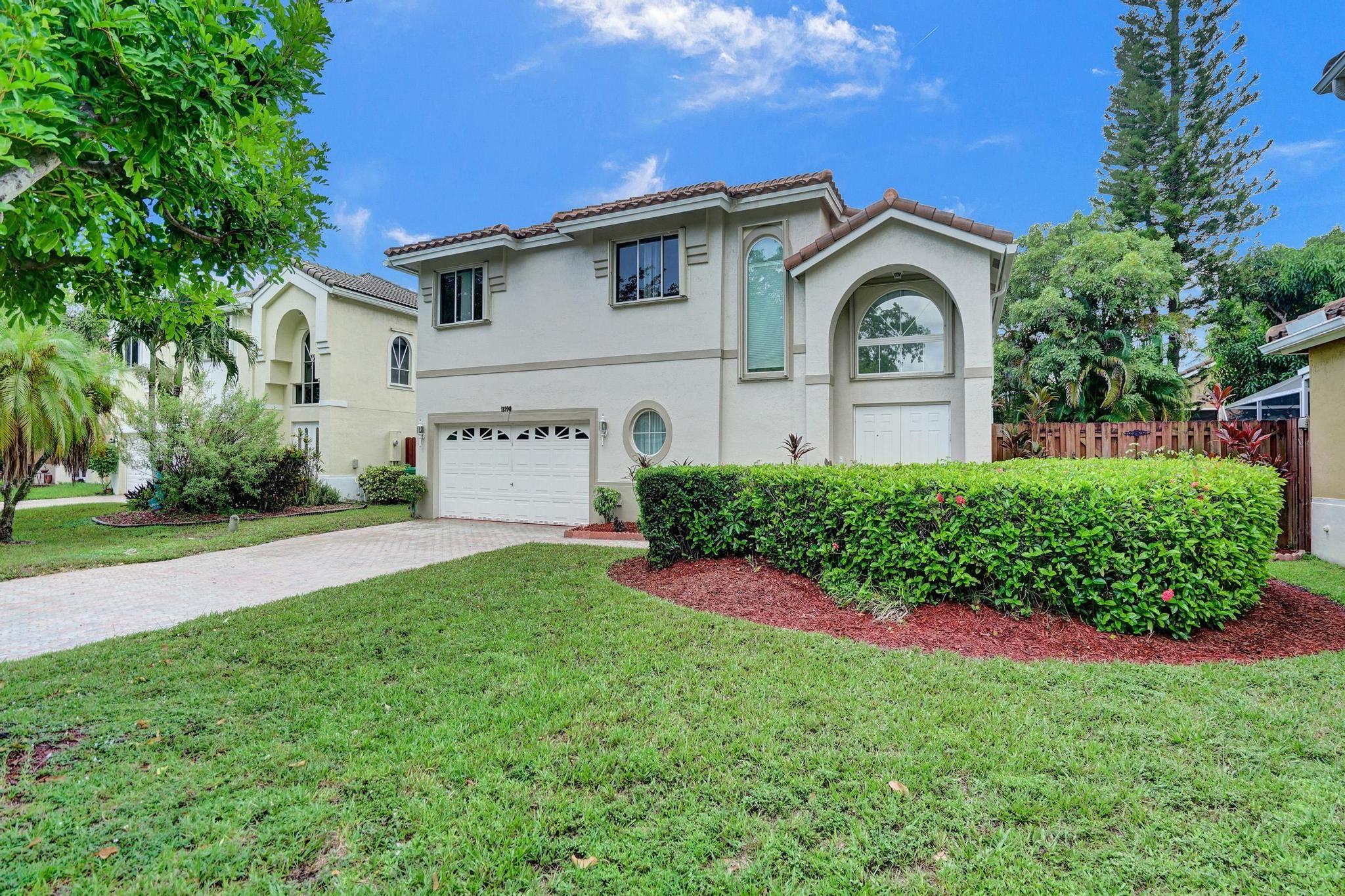 Behind the gates of Reflections at Rock Creek, this 3-bed, 2.5-bath home serves up style, comfort, & just the right dose of what you need The tile roof (2021) & AC (2022) have you covered—literally & figuratively. Inside, soaring ceilings & an abundance of natural light make every day feel like a Florida postcard. The updated kitchen checks all the boxes with its countertops, appliances, & room to actually cook (or just artfully arrange takeout). Fresh paint throughout, brand-new flooring on the stairs & upstairs, plus a mix of accordion & impact protection means peace of mind is already built in. Outside your door, across the street, is the community's clubhouse & pool, & also Rock Creek delivers: 2.75 miles of walk/jog path, lakes, parks, tot lots, & more. Top-rated schools? You bet.