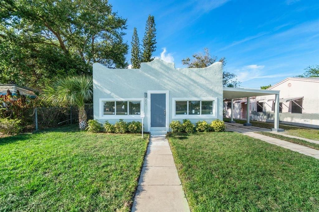 Photo of 227 Date Palm Drive, Lake Park, FL 33403 (MLS # R10704708)