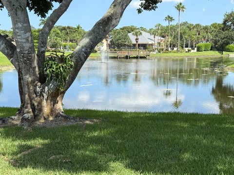 Photo of 10884 LAKE FRONT Place, Boca Raton, FL 33498 (MLS # B26064563)