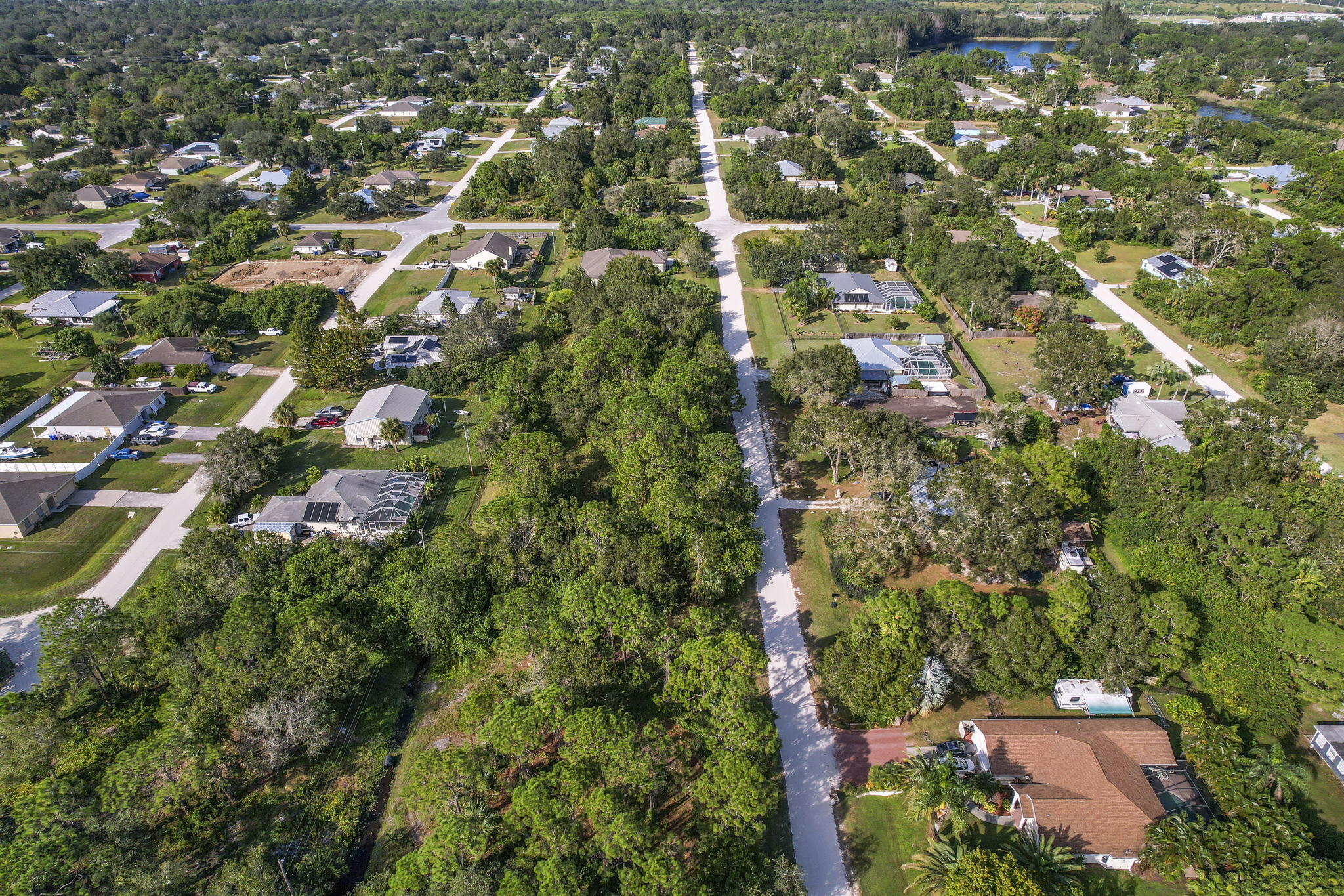 Vero Lake Estates .30 Acre oversized building lot. Room for home and accessory building! No HOA- no neighborhood restrictions on house style, fence or garage! Code ordinances only. Located on sandy road off of 87thSt- primary paved access out of neighborhood. Buildable lot close to all grocery stores, big box stores, and AtlanticBeaches-just 10 mins away!