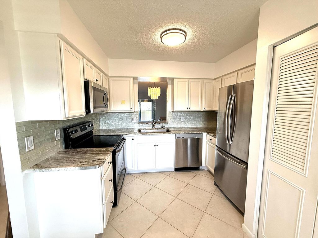 Photo of 14310 Strathmore Lane #207, Delray Beach, FL 33446 (MLS # R11167771)