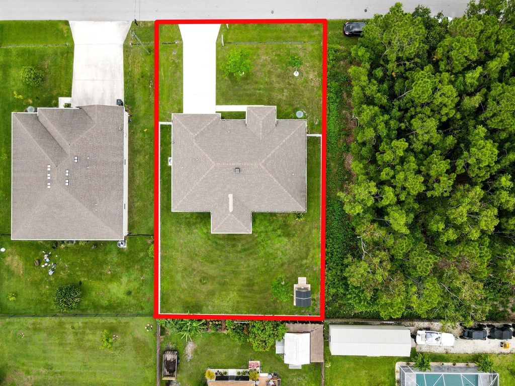 Photo of 6700 NW Omega Road, Port Saint Lucie, FL 34983 (MLS # R11097308)