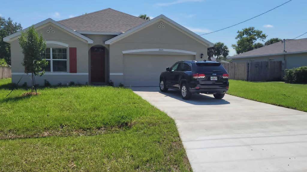 Photo of 2525 SW WESTFIELD Street, Port Saint Lucie, FL 34953 (MLS # B26053970)