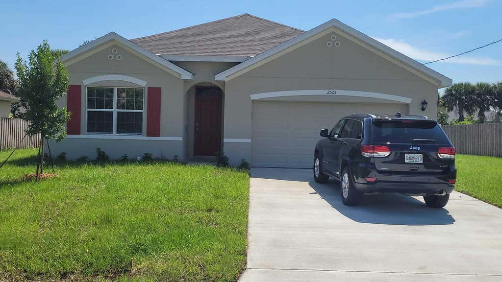 Photo of 2525 SW WESTFIELD Street, Port Saint Lucie, FL 34953 (MLS # B26053970)