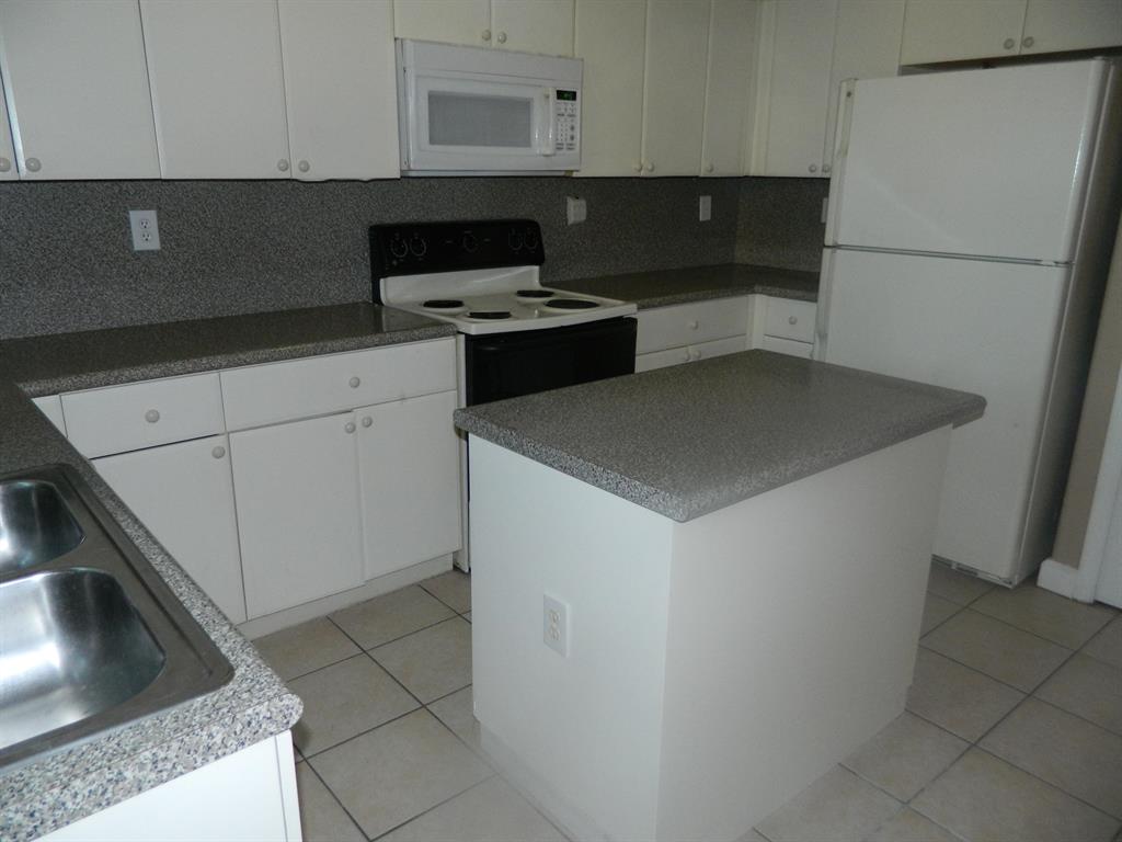 SHOMA TOWNHOMES AT ROYAL PALM BEACH CONDO - Residential Lease