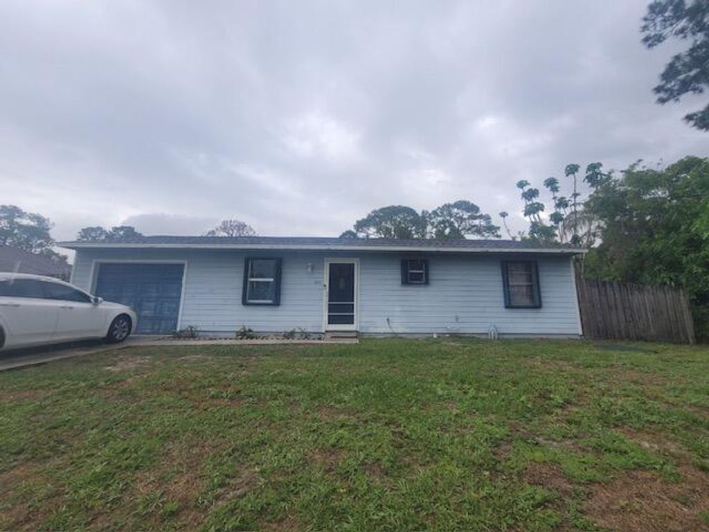 Photo of 133 SW Essex Drive, Port Saint Lucie, FL 34984 (MLS # B26018070)