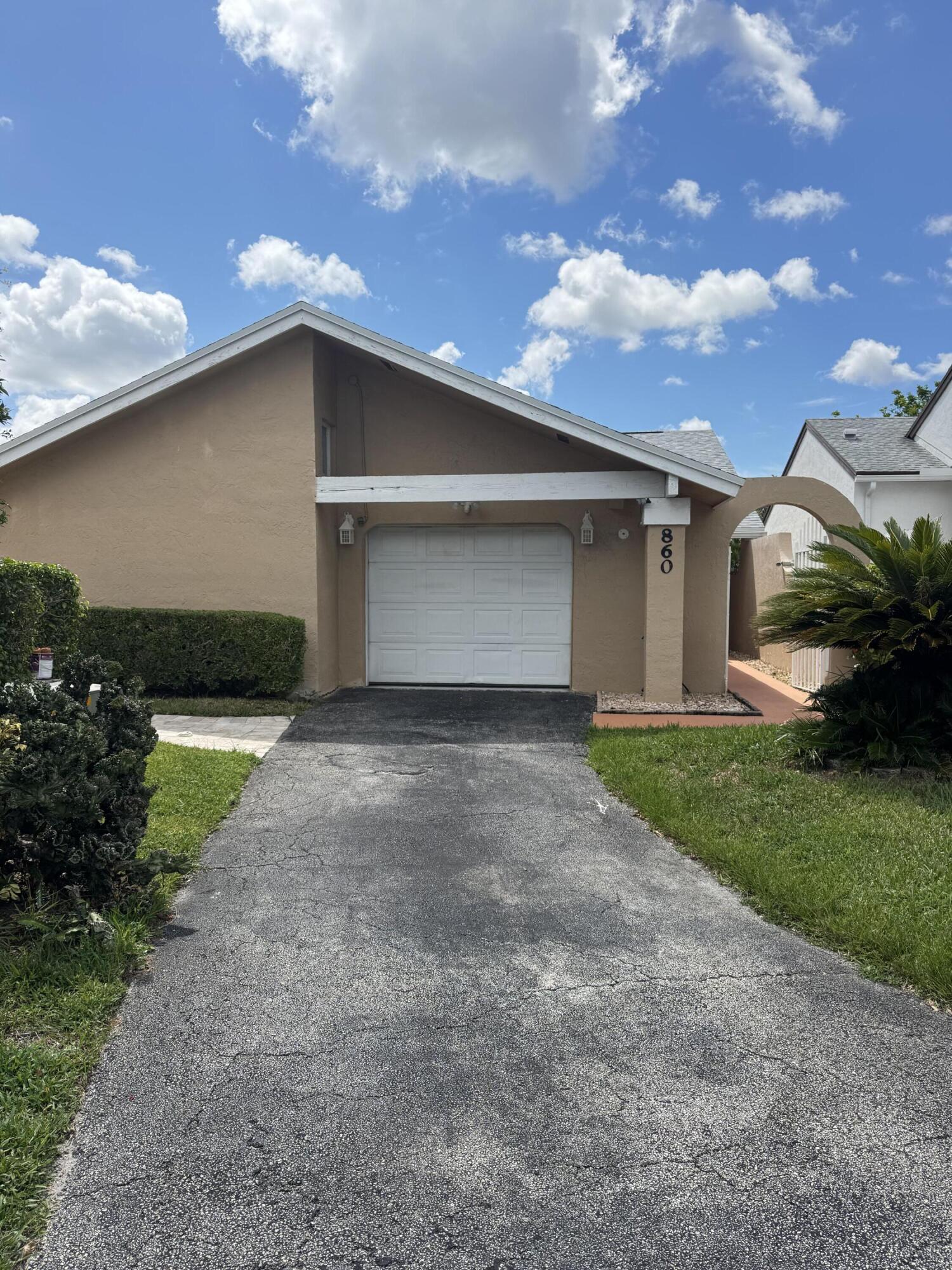 Spectacular 3/2/1 in a sought after Delray boating community. Fenced in lot with custom built in summer kitchen and pergola. Updated eat in it kitchen with plenty of counter and cabinet space. Loads of natural light. Custom mirrored foyer entry way. Spacious master suite with large tub, sunken shower, dual sinks and walk in closet. Automatic Sprinkler System Boating Permitted. Zoned for Atlantic High School Offering Baccalaureate Program. CLOSE TO 95, AND TRENDY DOWNTOWN DELRAY. MINUTES TO BEACH, SHOPPING, DINING AND NIGHTLIFE. 2 COMMUNITY POOLS, JACUZZI, KIDDY POOL, BOATING, TENNIS, BASKETBALL, SCENIC JOGGING TRAIL AROUND THE LAKE.