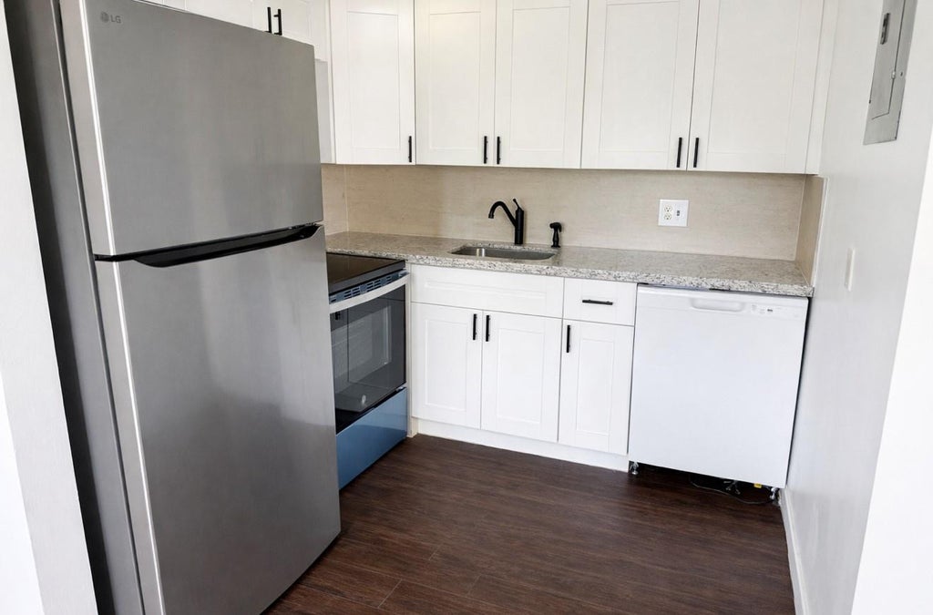 Photo of 3081 NW 47TH Terrace #107, Lauderdale Lakes, FL 33313 (MLS # B26071719)
