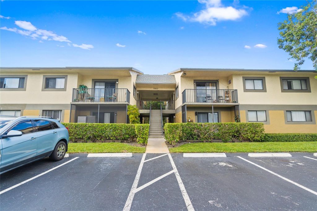 Photo of 567 Trace Circle #104, Deerfield Beach, FL 33441 (MLS # B26035193)
