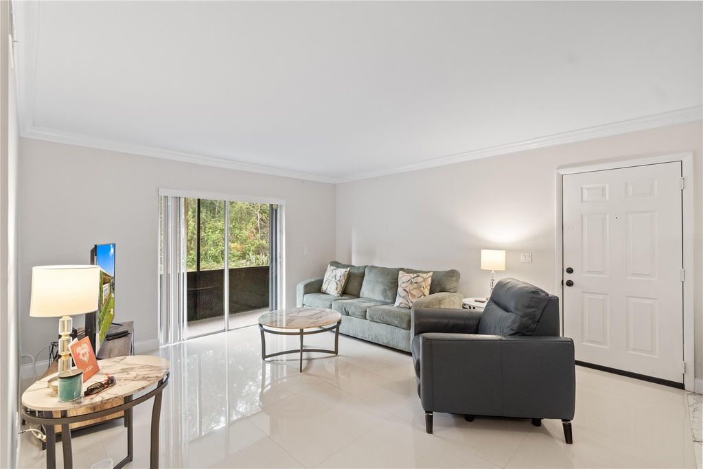 Photo of 567 Trace Circle #104, Deerfield Beach, FL 33441 (MLS # B26035193)